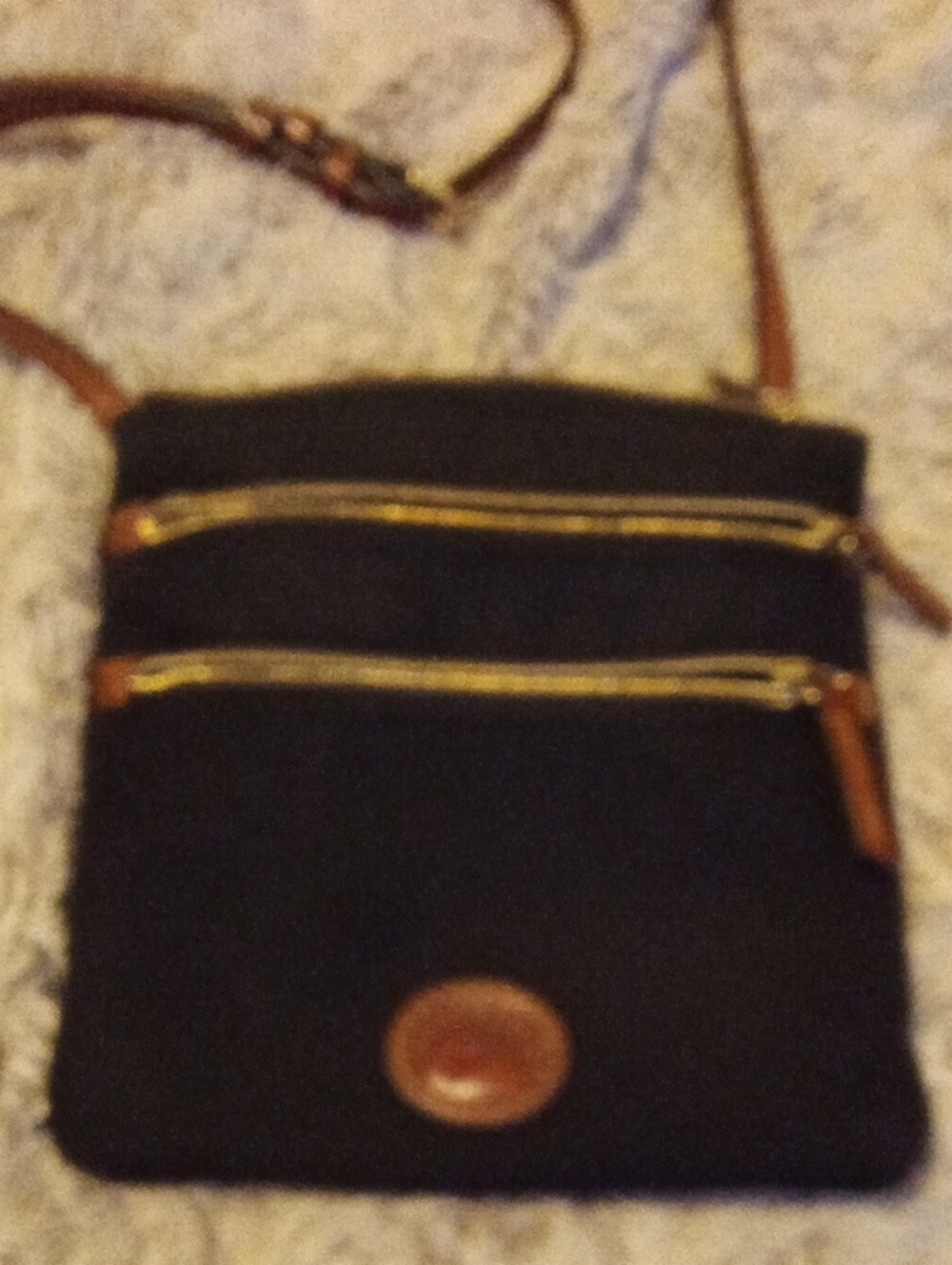 Dooney & Bourke Black Crossbody with Gold Hardware and Brown Leather Logo